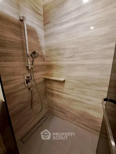 Modern bathroom with sleek shower design and elegant tile work