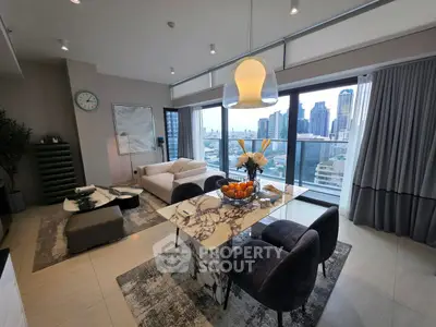 Luxurious living room with stunning city view, elegant decor, and modern furniture in high-rise apartment.
