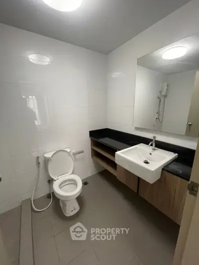 Modern bathroom with sleek fixtures and spacious layout