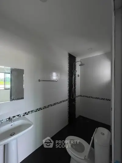 Modern bathroom with sleek design and shower area