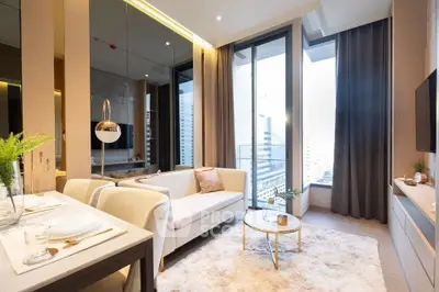 Luxurious modern living room with city view, elegant decor, and cozy ambiance in high-rise apartment.
