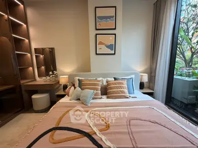 Modern bedroom with stylish decor, large window, and cozy lighting, perfect for relaxation and comfort.
