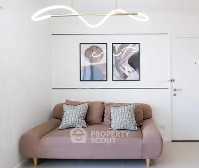 Modern living room with stylish sofa and contemporary art decor