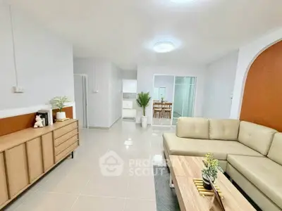 Spacious modern living room with sleek furniture and open layout
