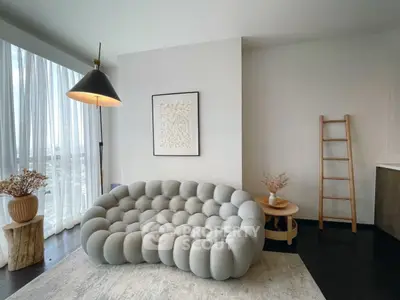 Stylish modern living room with unique bubble sofa and elegant decor