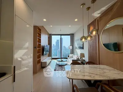 Luxurious modern living room with city view, elegant decor, and stylish lighting in high-rise apartment.