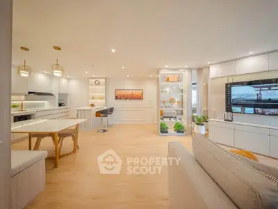 Spacious modern living room with open kitchen and elegant decor