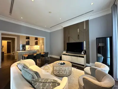 Luxurious open-plan living room with modern kitchen and elegant decor