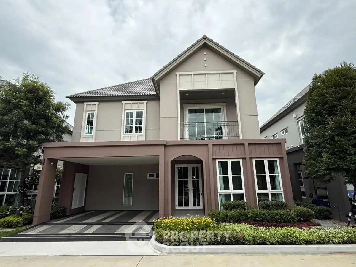 Elegant two-story house with modern design and landscaped garden