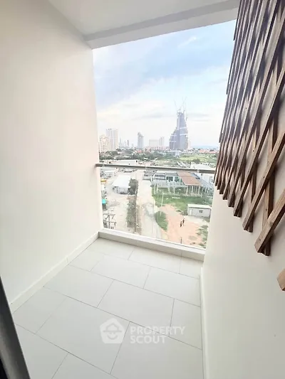 Modern balcony with city view in high-rise apartment