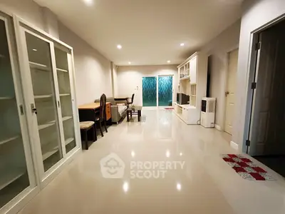 Spacious living room with modern furniture and sleek flooring