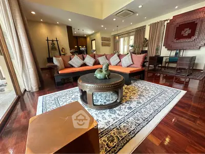 Luxurious living room with elegant decor and hardwood flooring