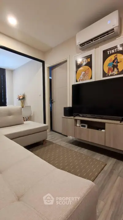 Modern living room with stylish decor and entertainment setup