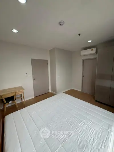 Modern bedroom with minimalist design and natural light