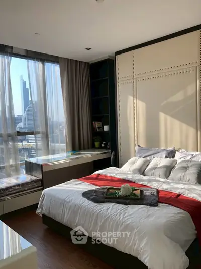 Luxurious bedroom with city view and elegant decor