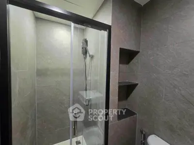 Modern bathroom with sleek shower and minimalist design