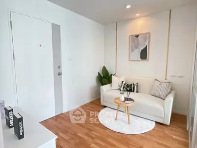 Charming living room with cozy white sofa and modern decor