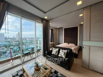 Luxurious studio apartment with stunning city view and modern interior design.