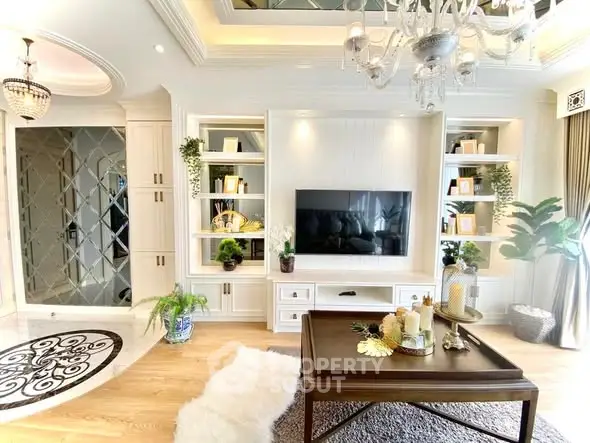 Luxurious living room with elegant decor and built-in TV unit