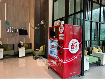Modern condo lobby with vending machine and stylish seating area