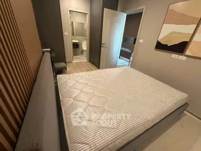 Modern bedroom with ensuite bathroom and stylish decor