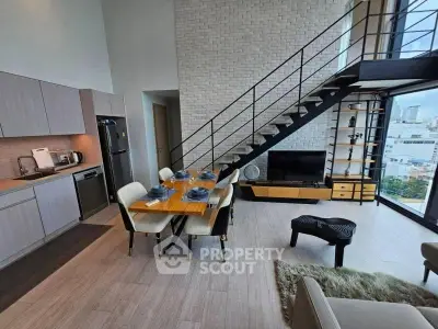 Modern loft apartment with open kitchen and stylish living area