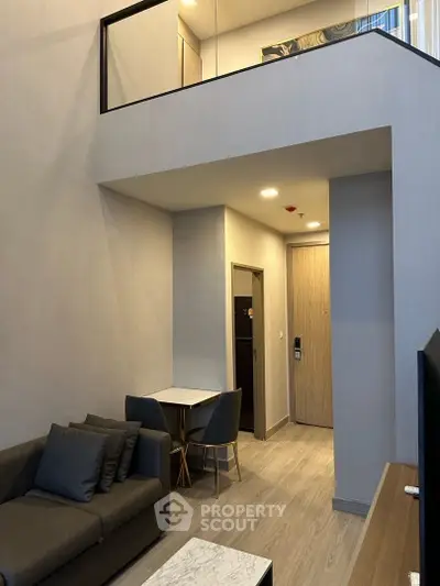 Modern loft apartment with high ceilings and stylish furniture