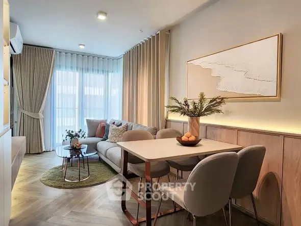 Modern living room with elegant decor, cozy seating, and natural light, perfect for relaxation and entertaining.