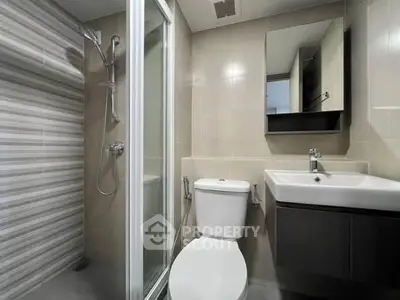 Modern bathroom with sleek shower and contemporary fixtures