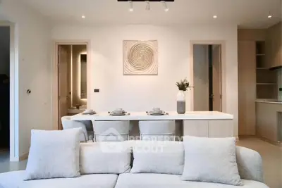 Modern living room with elegant dining area and stylish decor