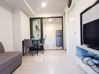 Modern apartment interior with open layout and sleek kitchen design