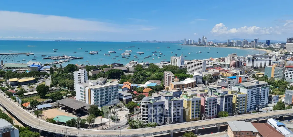 Stunning coastal cityscape with vibrant buildings and ocean view, perfect for urban living enthusiasts.