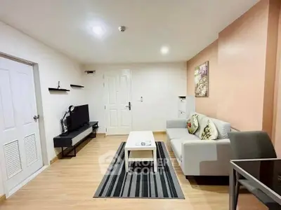 Modern living room with stylish decor and cozy seating area, perfect for relaxation and entertainment.