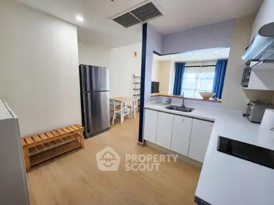 Spacious modern kitchen with open layout and sleek appliances