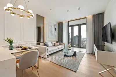 Luxurious modern living room with city view, elegant decor, and stylish furniture.