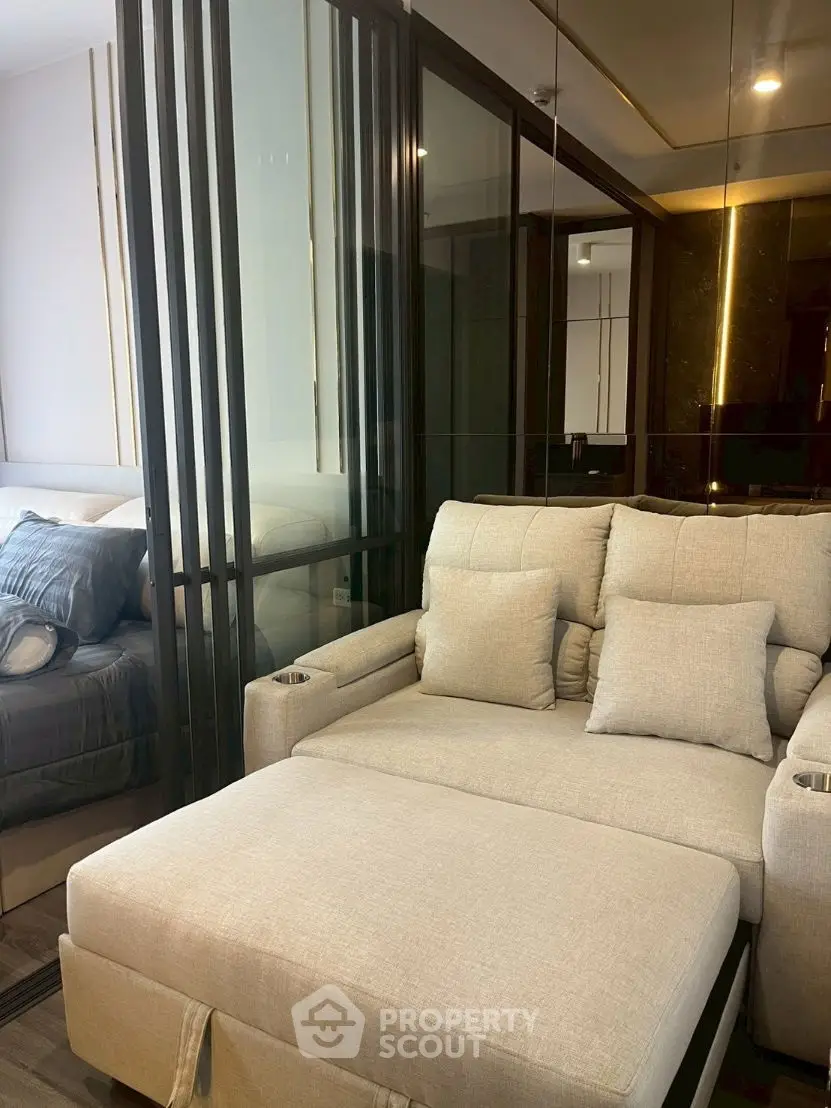 Luxurious modern living room with plush beige sofa and elegant decor