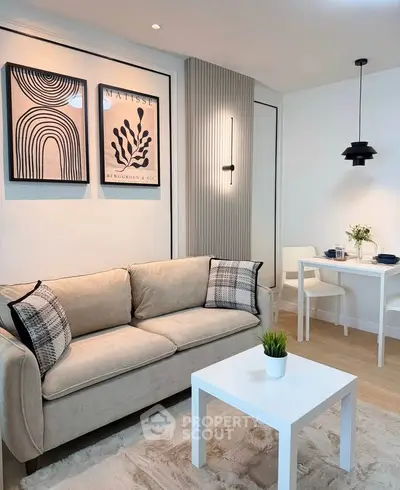 Modern living room with stylish decor and cozy seating area, perfect for relaxation and entertaining.