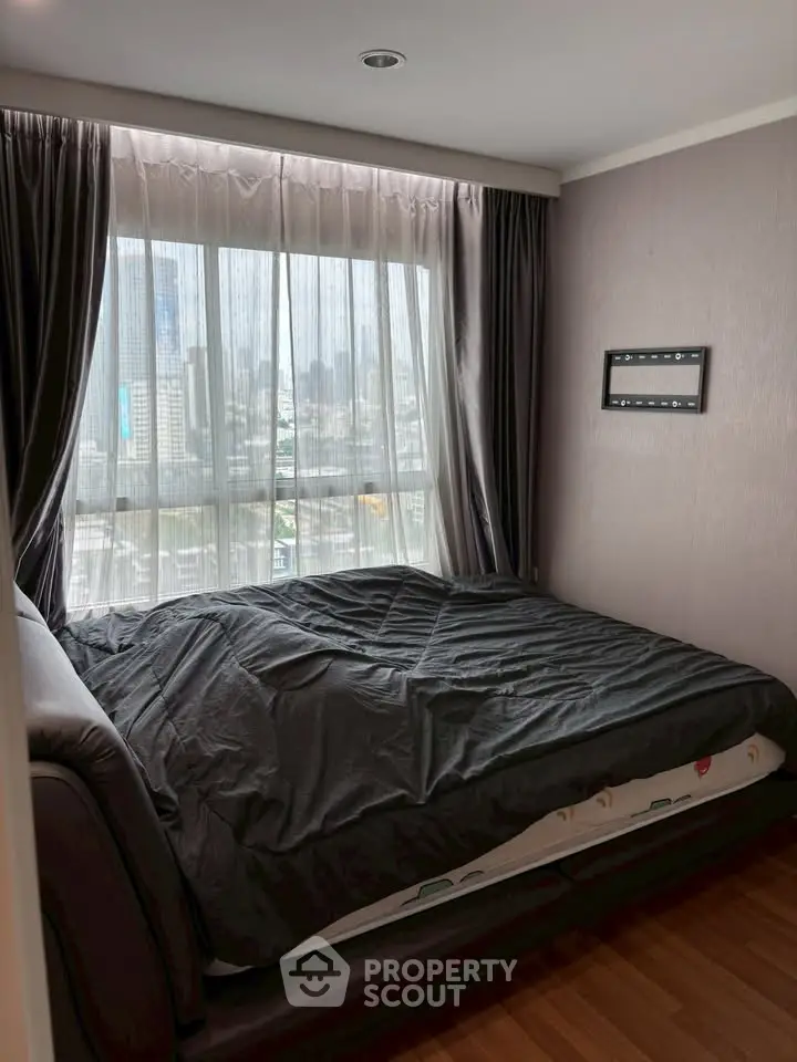 Cozy bedroom with city view and modern decor