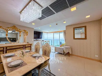 Luxurious dining and living area with ocean view and elegant decor