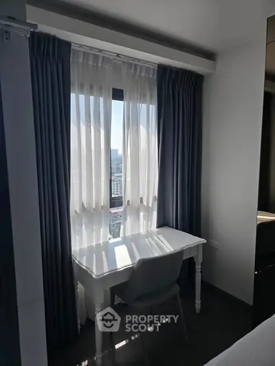 Bright study area with a window view in modern apartment