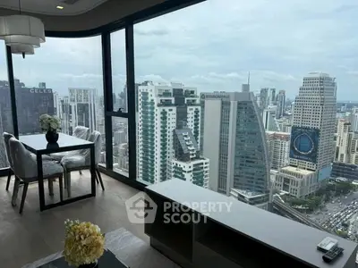 Stunning high-rise apartment with panoramic city views and modern interior design.