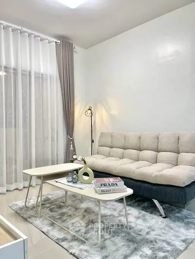 Stylish modern living room with plush sofa and elegant decor