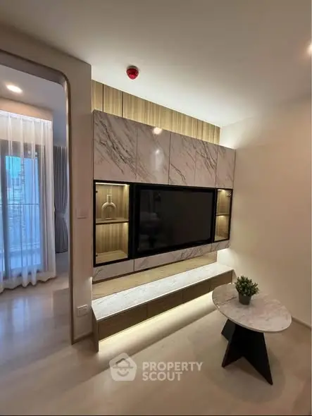 Modern living room with stylish TV wall unit and elegant decor