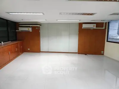 Spacious office space with modern design and ample natural light.