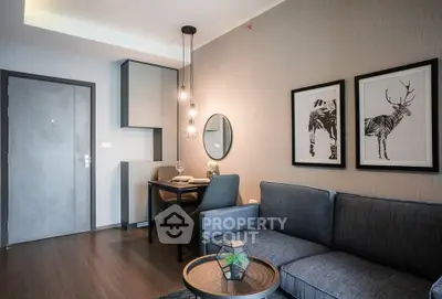 Modern living room with stylish decor and cozy seating area in a contemporary apartment.