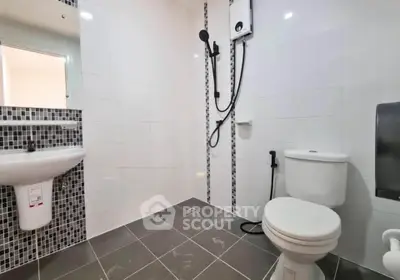 Modern bathroom with sleek fixtures and stylish tile accents