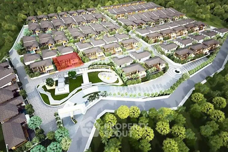 Aerial view of modern residential complex with lush greenery and well-planned layout.