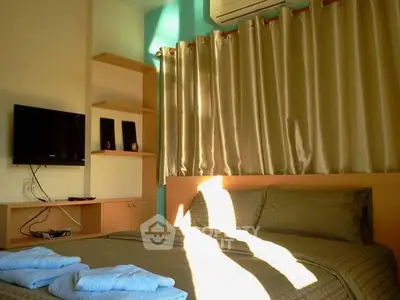 Cozy bedroom with modern decor and natural light