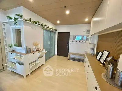 Spacious modern living room with stylish decor and ample storage solutions.