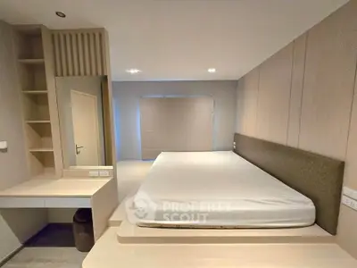 Spacious modern bedroom with minimalist design and built-in storage